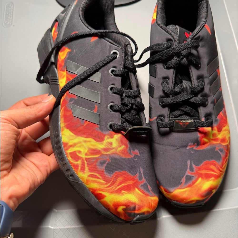 Adidas Black Sneakers with Red Skull Detail